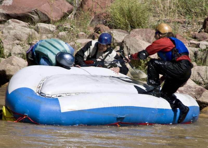 Flipping the loaded raft back up