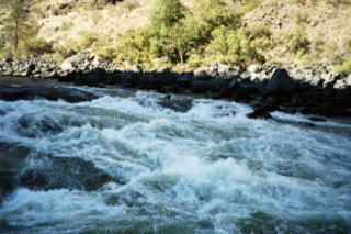 Mark Adams runs the river left route at Granite Rapids