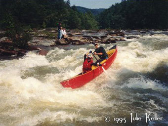 Tandem canoeists in Tablesaw Rapid