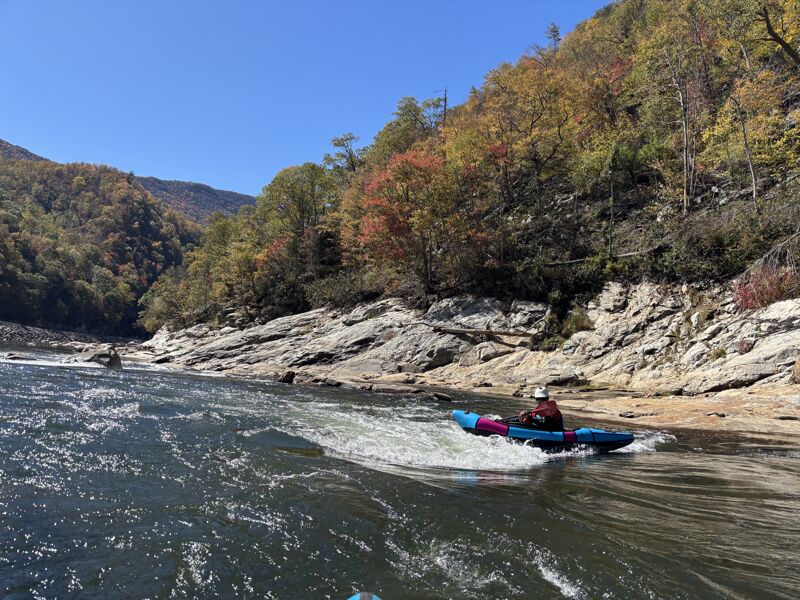 Surfing at the top of rooster tail