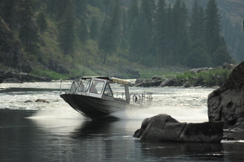 Jet Boat Passing Johnson Creek Camp