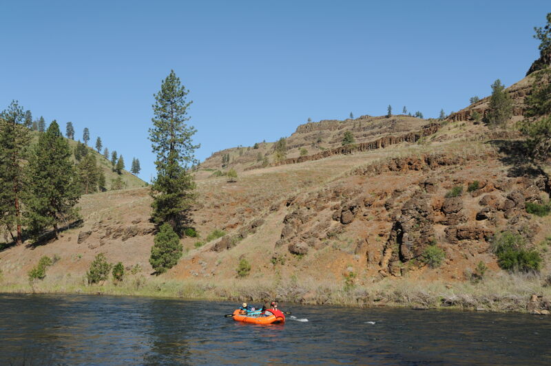 Raft Group Passing by Camp
