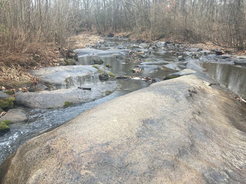 Just before the river confluence.