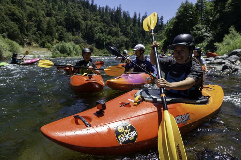 In the eddy at the surf wave above Rock Creek